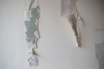 restoration of an architectural monument, repair of a room, old wallpaper, stucco