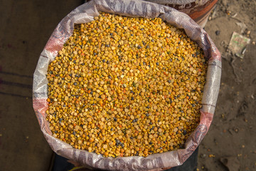 Split Chickpea , Chana Dal, Dried Chickpea Lentils or Toor Dal in a burlap bag. 
