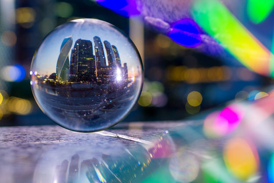 A picture of the city through a glass sphere
