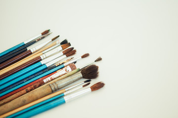 Fototapeta premium Set of paint brushes on the white background