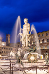 Italy, Florence, Neptune fountain in Signoria square (Piazza della Signoria) at Dusk