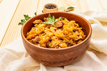 Stewed (braised) cabbage served on ethnic ceramic bowl