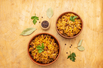 Stewed (braised) cabbage served on ethnic ceramic bowl