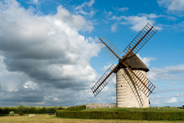 Fototapeta na wymiar horizontal view of the historic windmill Moulin de Pierre in Hauville in Normandy