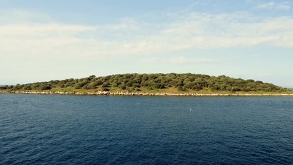 Rocky shore. View of rocky mountain from the Mediterranean sea surface. Greece. 4K