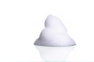 White foam bubbles texture isolated on white
