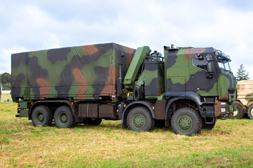 Military armored truck from german army stands on a field