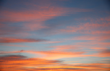 Naklejka na ściany i meble Beautiful cloudy sky at sunset.
