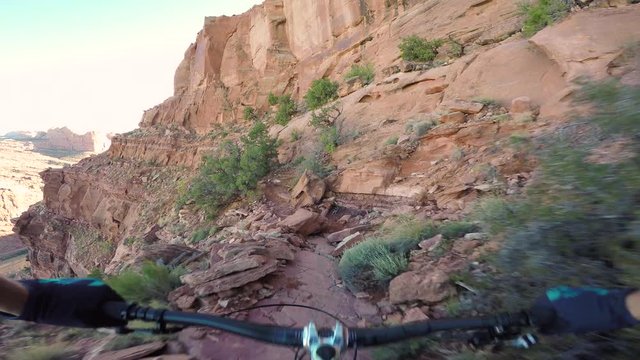Mountain Biker On The Edge Of A Cliff