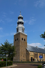 Fototapeta premium Monumental tower of church in Dutch city Hindeloopen