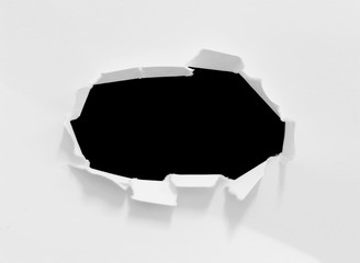 pieces of torn paper texture on black background, copy space.