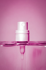 pink perfume bottle head detail