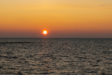 Fototapeta premium beautiful sunrise seashore over the Curonian Lagoon in Nida resort town, Neringa, Lithuania
