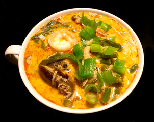 Spicy Asian seafood Curry Laksa Soup with prawns, vegetables and a creamy delicious coconut curry broth