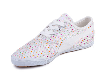 One white dotted pattern fiber fabric casual sneakers shoe isolated white background