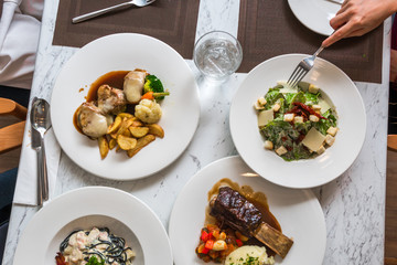 Food on the white mable table in luxury restaurant , Top view ,