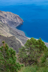 Las playas viewpoint, with pine trees and cliff view, and Atlantic ocean background, El Hierro island, Canary islands, Spain