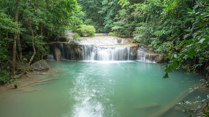 Waterfall in rain forest at Erawan National Park at Kanchanaburi in Thailand