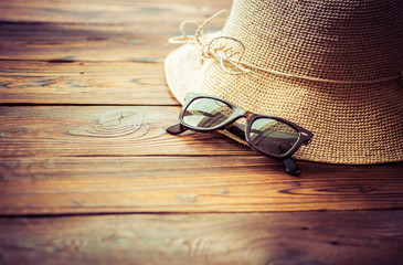 Women straw foldable hat and subglasses for summer travel and beach holiday.