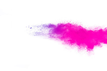 Freeze motion of purple color powder exploding on white background.