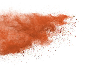 Brown powder explosion isolated on white background.