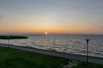 beautiful sunrise seashore over the Curonian Lagoon in Nida resort town, Neringa, Lithuania
