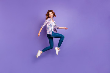 Fototapeta na wymiar Full length photo of cool foxy lady jumping high going to shopping center wear casual outfit isolated purple color background
