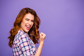Photo of pretty foxy lady champion winking eye raising fist well done job wear plaid casual shirt...