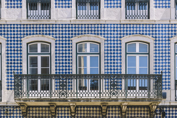 typical vintage balcony with tiles at Lisbon