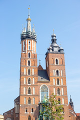 St. Mary's basilica in main square of Krakow, main square, famous cathedral in summer day