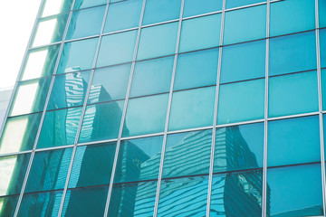 Fototapeta na wymiar facade of skyscraper business center close-up of the city background