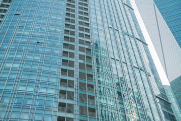 Fototapeta na wymiar facade of skyscraper business center close-up of the city background