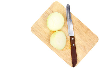 Cut in half onion and knife on wooden isolated on white background.