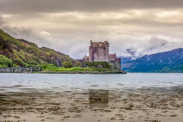 Eilean Donan Castle Scotland landmark Scottish old fortress medieval lake bay bridge beautiful view long exposure