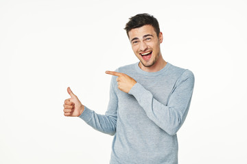 young man pointing at something interesting