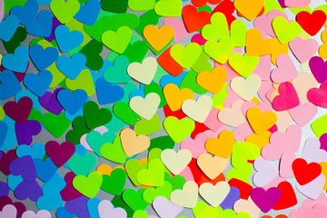 Paper rainbow colors hearts as a pattern for design