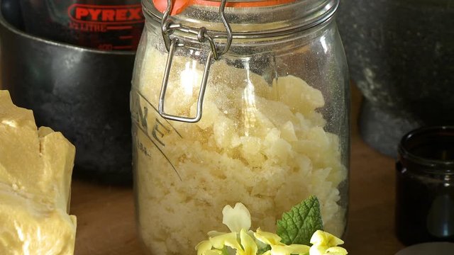 Close up of a mason jar with golden sugar chunks inside