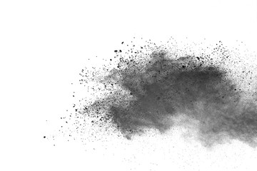 Abstract powder splatted background. Black powder explosion on white background. Colored cloud. 