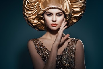 Woman in a golden hat