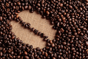 coffee beans on burlap background