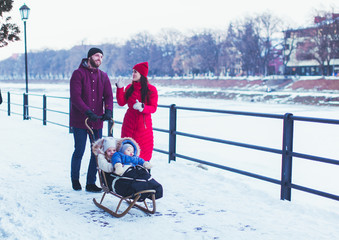 Young family on a winter city walk