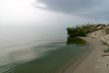 landscape with sea and sand dune shore, shore slip, calm water, Curonian Spit, Nida,, Lithuania....