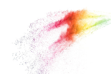 Freeze motion of colorful color powder exploding on white background.  Paint Holi.