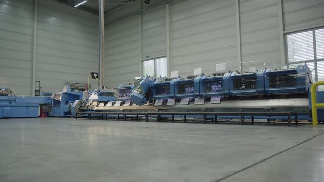 Druchmaschine Seitenansicht in Halle - Printmachine Sideview in a hall