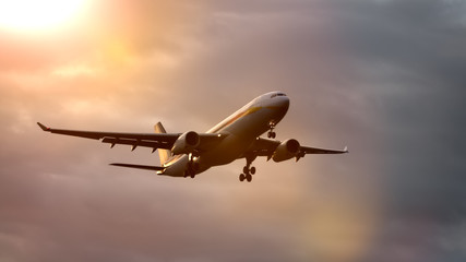 air plane in sunset sky