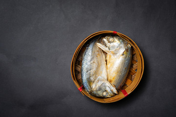 Mackerel fish on black background.