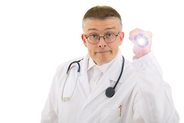 the doctor in a medical gown and a stethoscope on his shoulders looks closely and illuminates the flashlight. isolated background