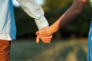 couple holding hands