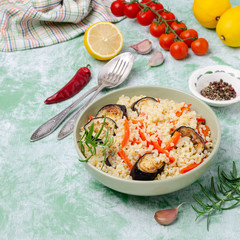 Bulgur with slices of fried vegetables