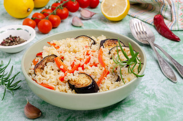 Bulgur with slices of fried vegetables